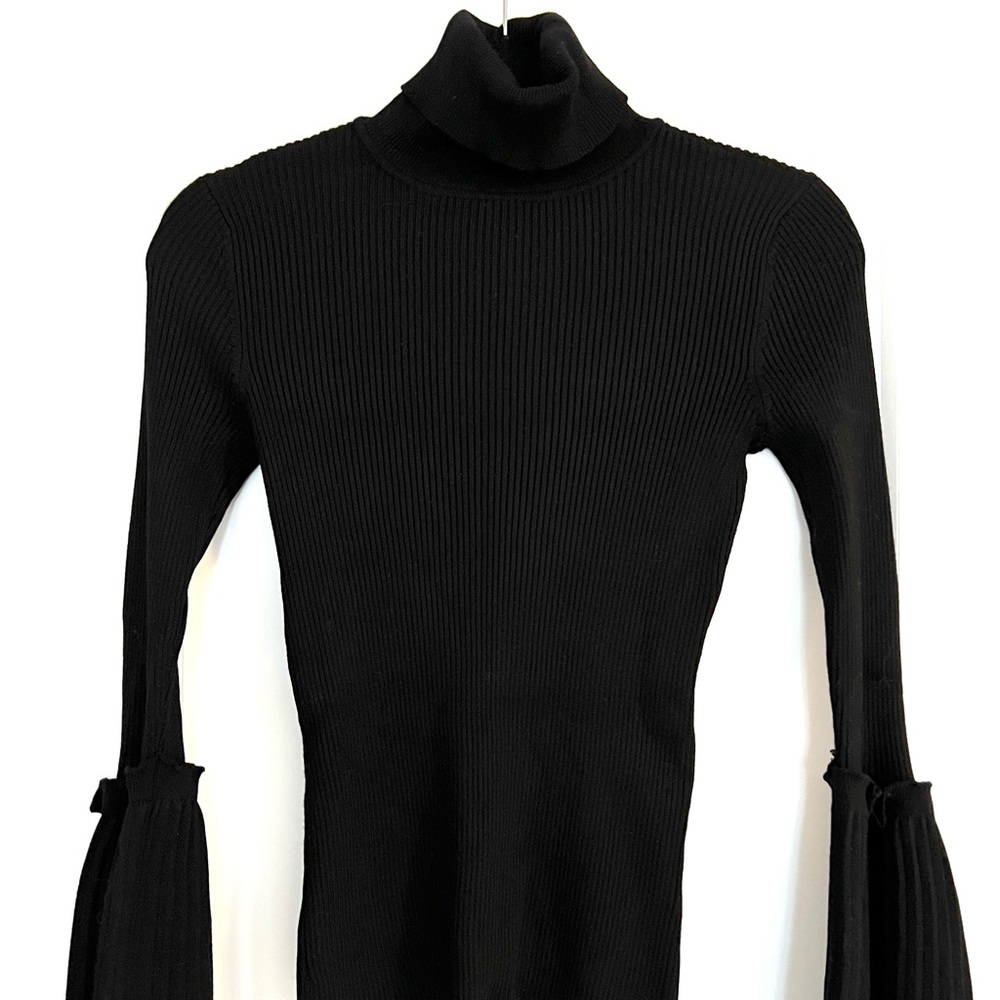 Design Lab turtleneck with wide fan cuffs.
